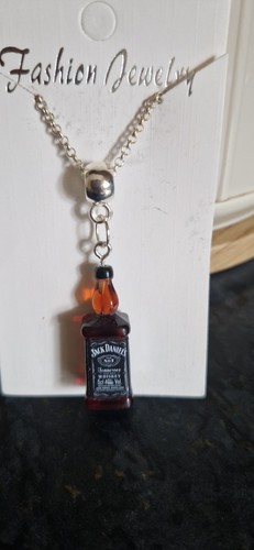 Silver jack daniels bottle - daniels,